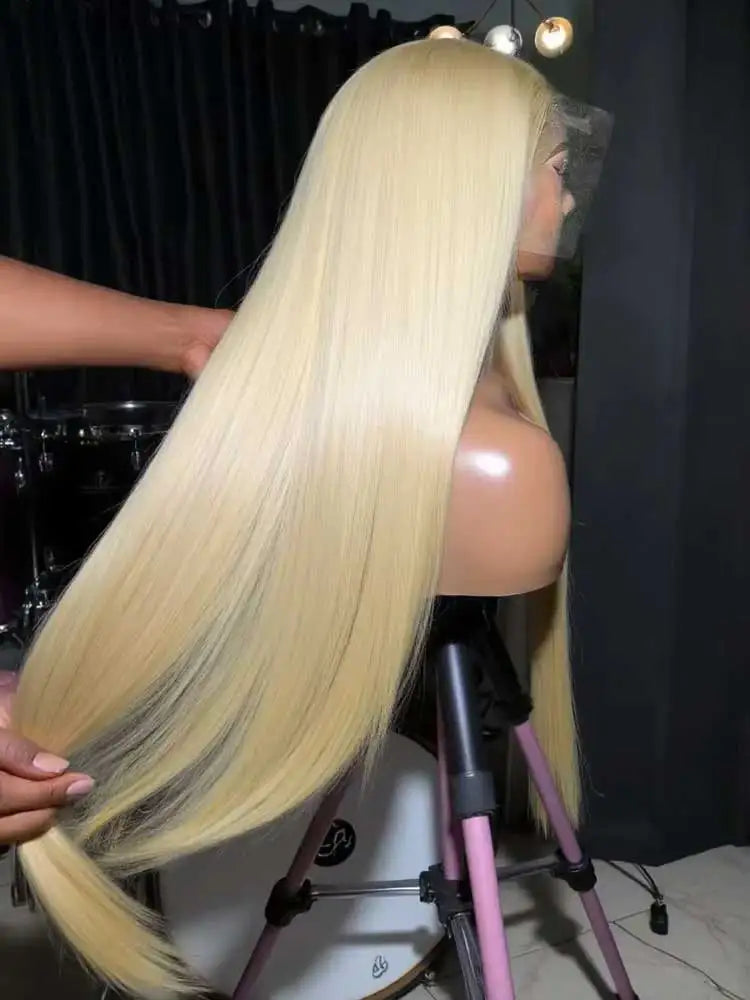 Honey blonde bone straight wig worn on model