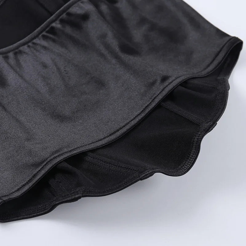 Corset crop top black folded flat lay