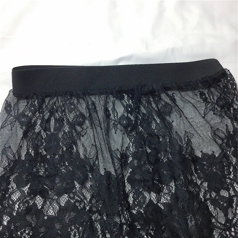 Lace mesh mini skirt worn as shirt extender