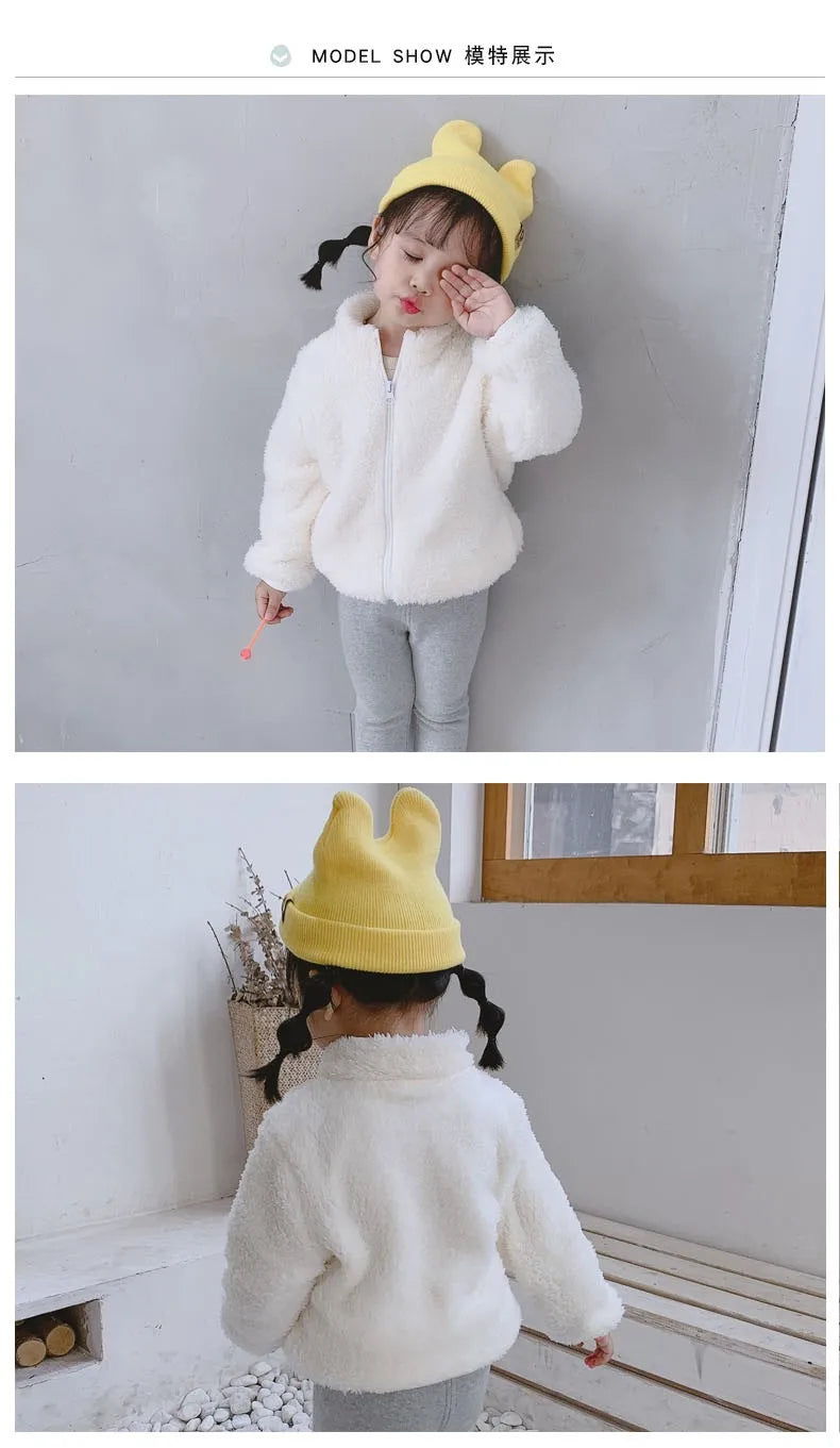 Kids plush winter coat lining texture closeup