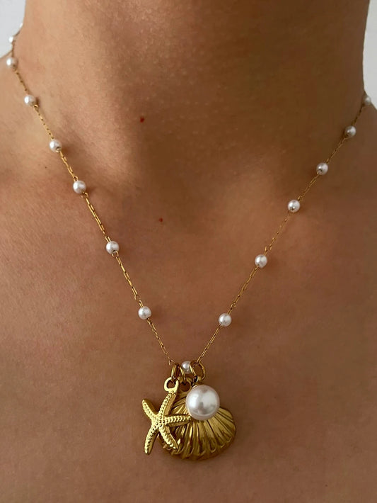 Pearl starfish shell necklace full view gold