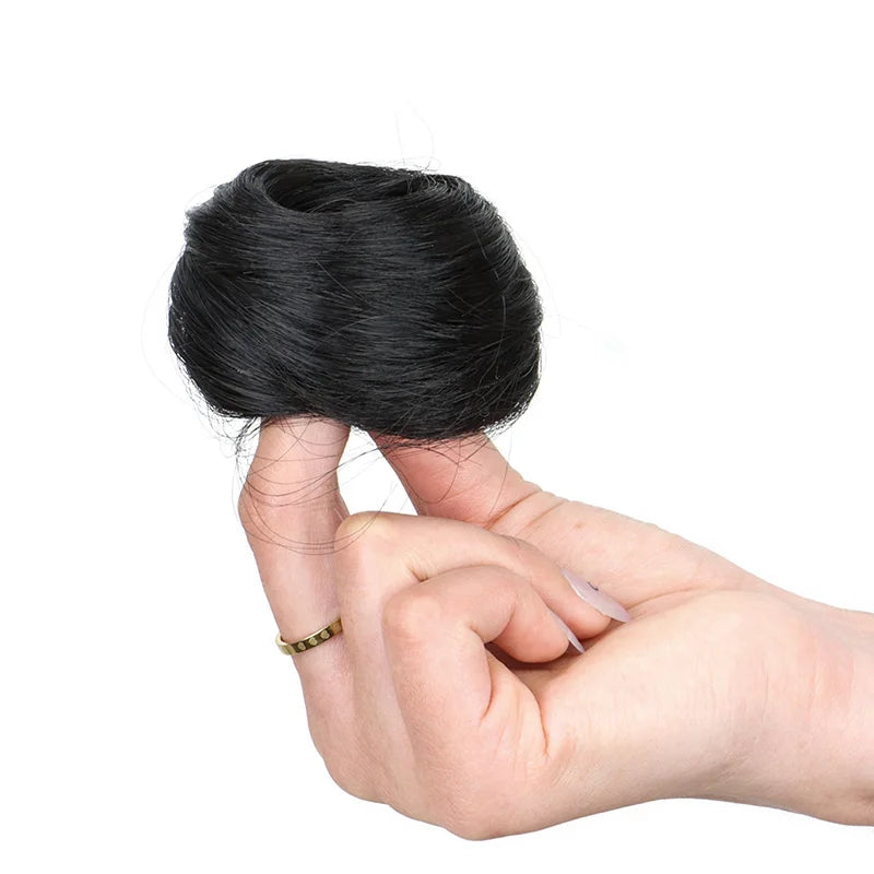 Synthetic hair bun extension worn on model