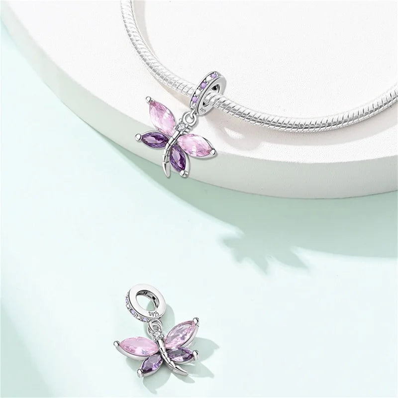 Butterfly charm beads attached to bracelet