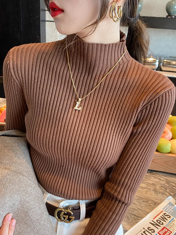 Slim turtleneck sweater beige worn close up