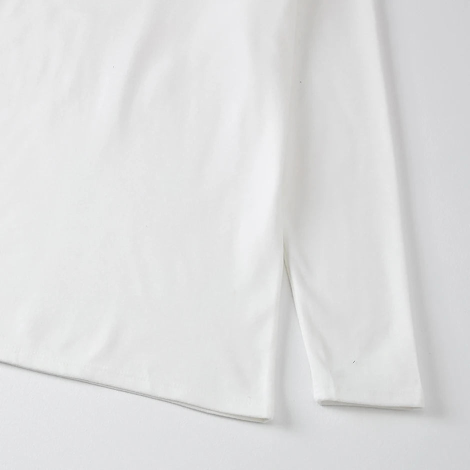 Men's semi-turtleneck long sleeve top worn under jacket