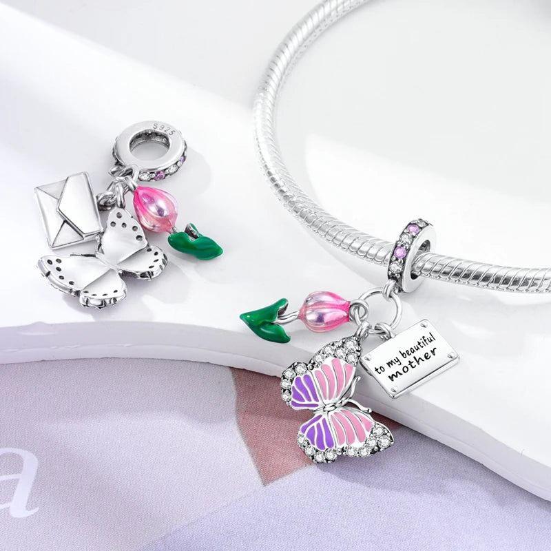 Butterfly charm beads attached to bracelet