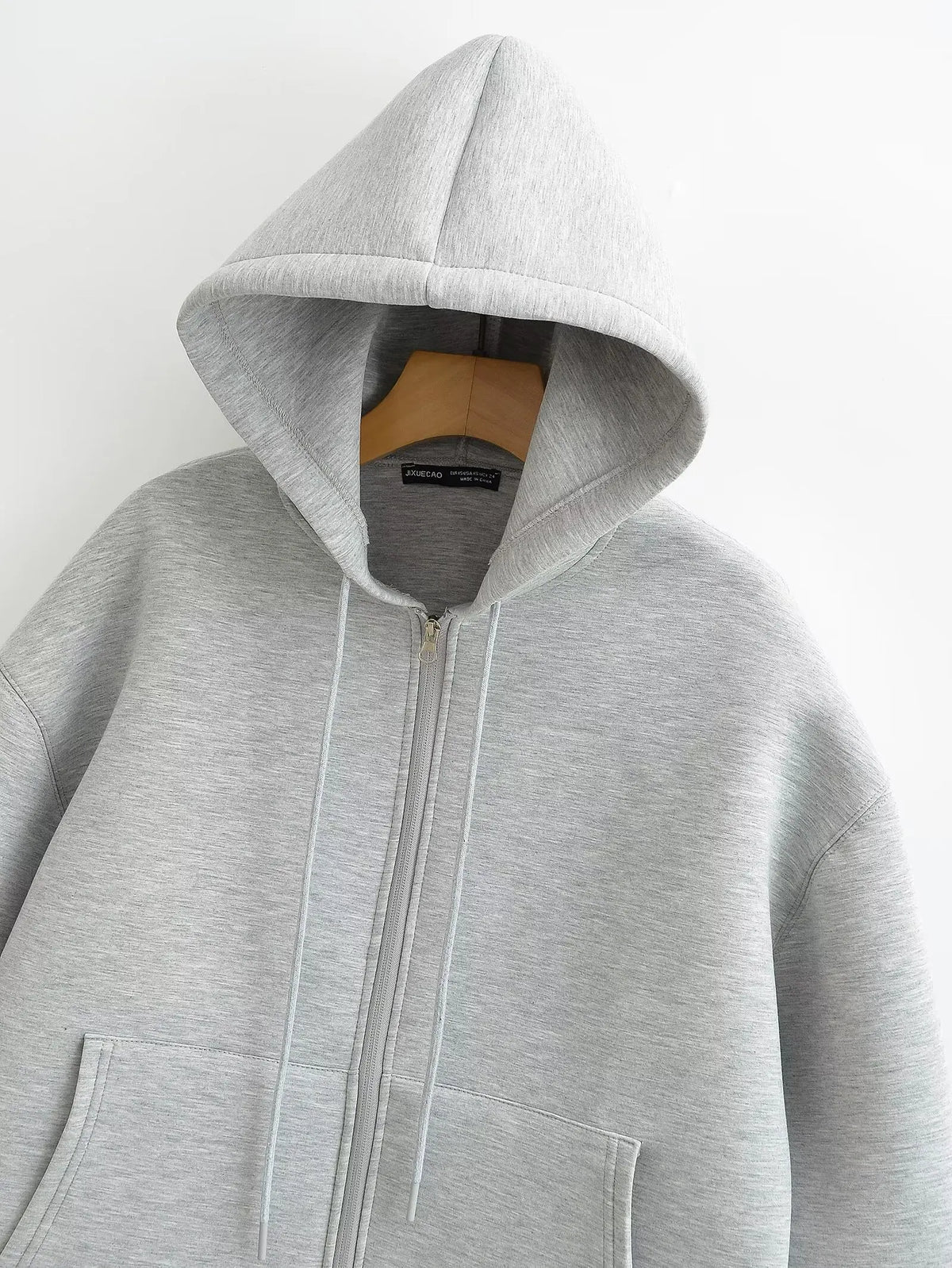Women's zip-up hoodie jacket front view dark grey