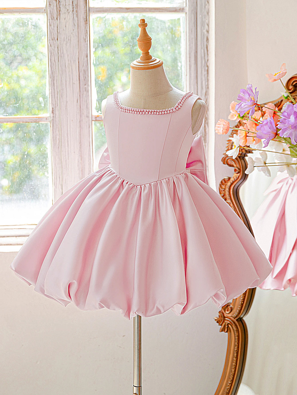 Girls bow tutu party dress worn by child