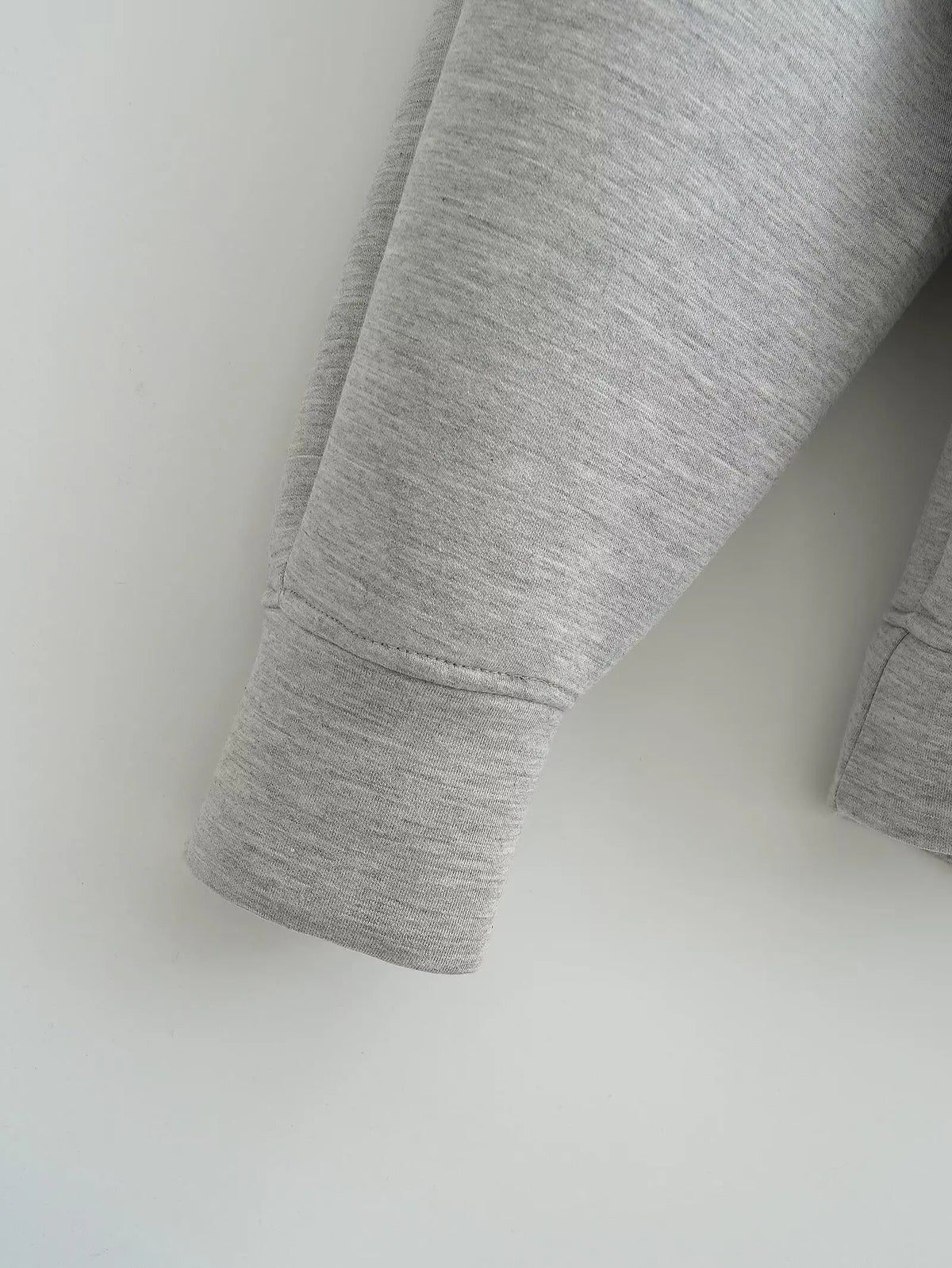 Women's zip-up hoodie jacket front view dark grey