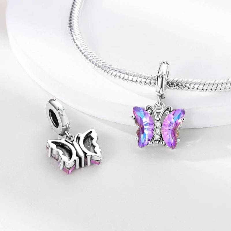 Butterfly charm beads attached to bracelet