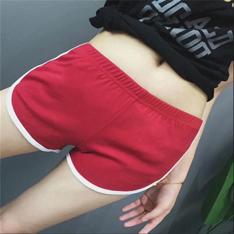 Skinny sports shorts red flat lay close up