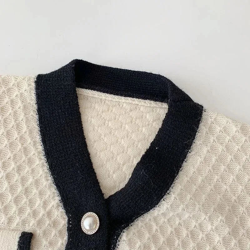 Oversized knit cardigan fabric texture closeup