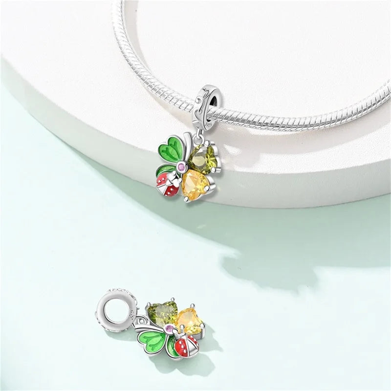 Butterfly charm beads attached to bracelet