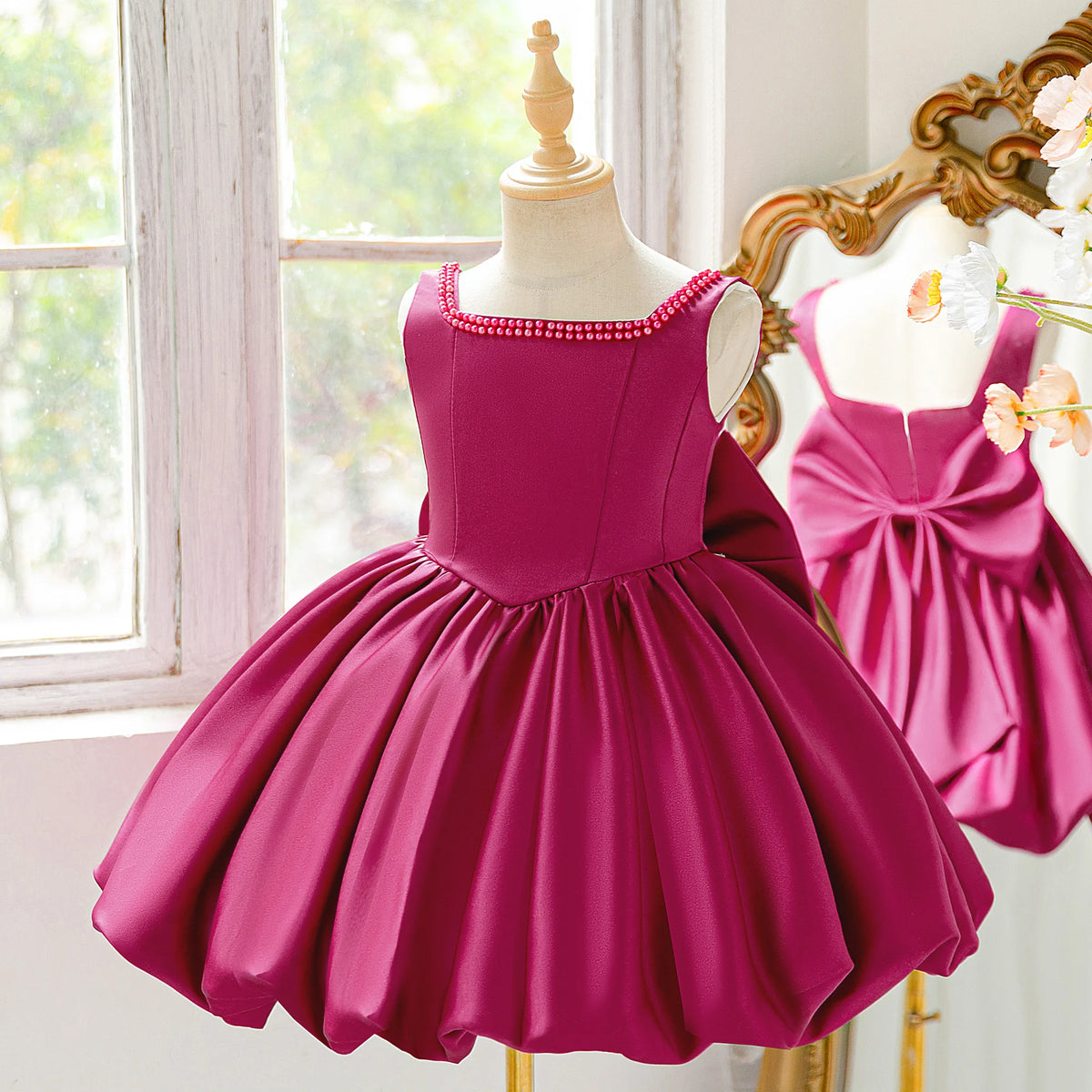 Girls bow tutu party dress worn by child