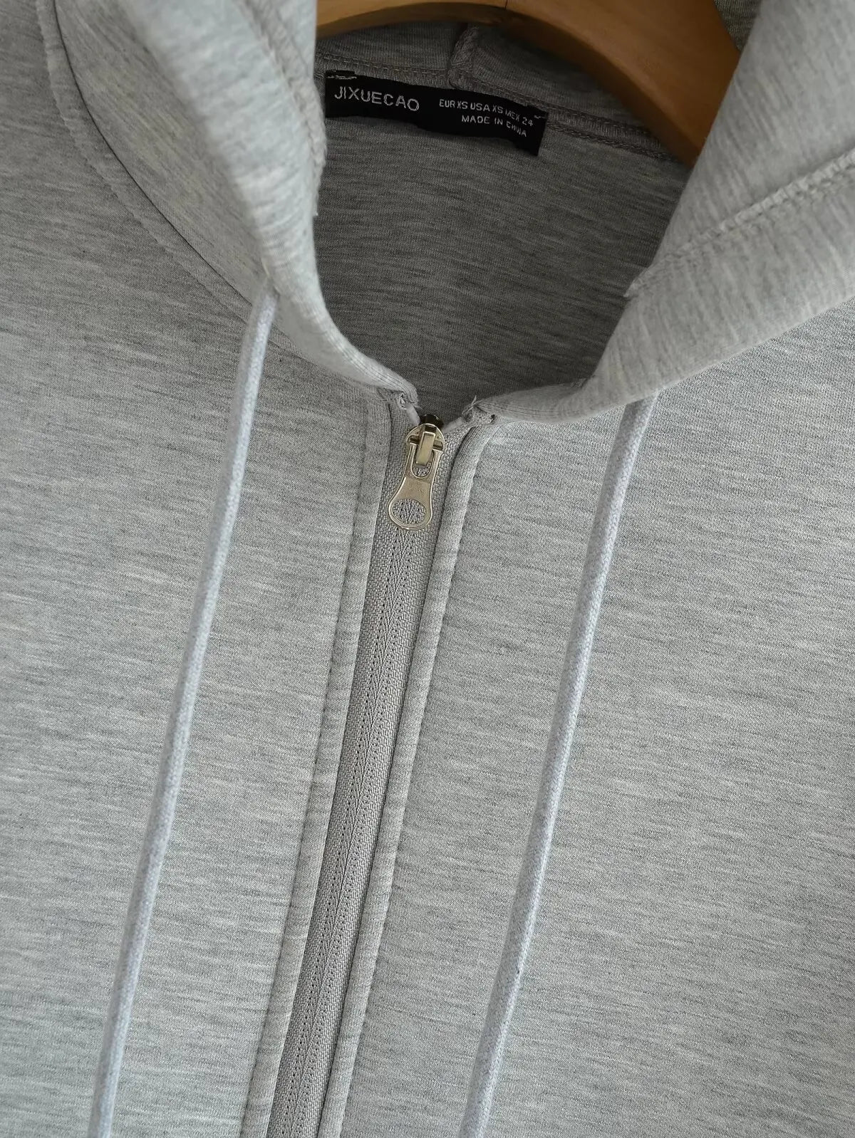 Women's zip-up hoodie jacket front view dark grey