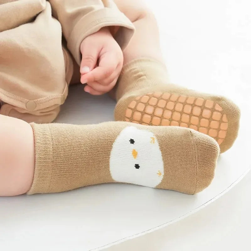Kids non-slip socks worn on child feet
