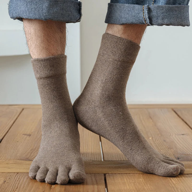 Wool toe socks worn on feet