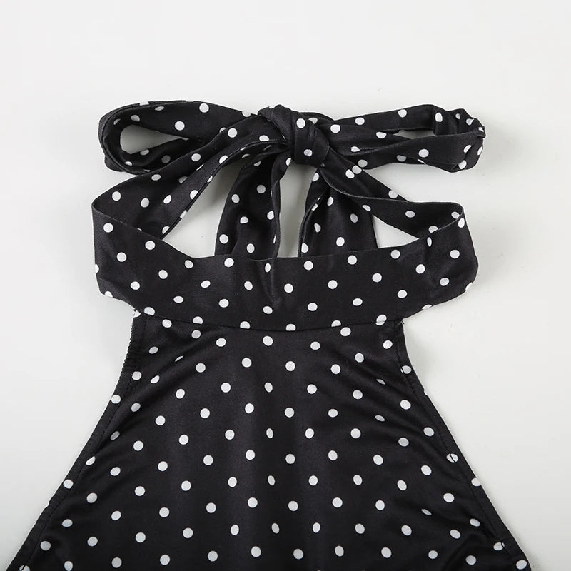 Polka dot halter dress on model standing