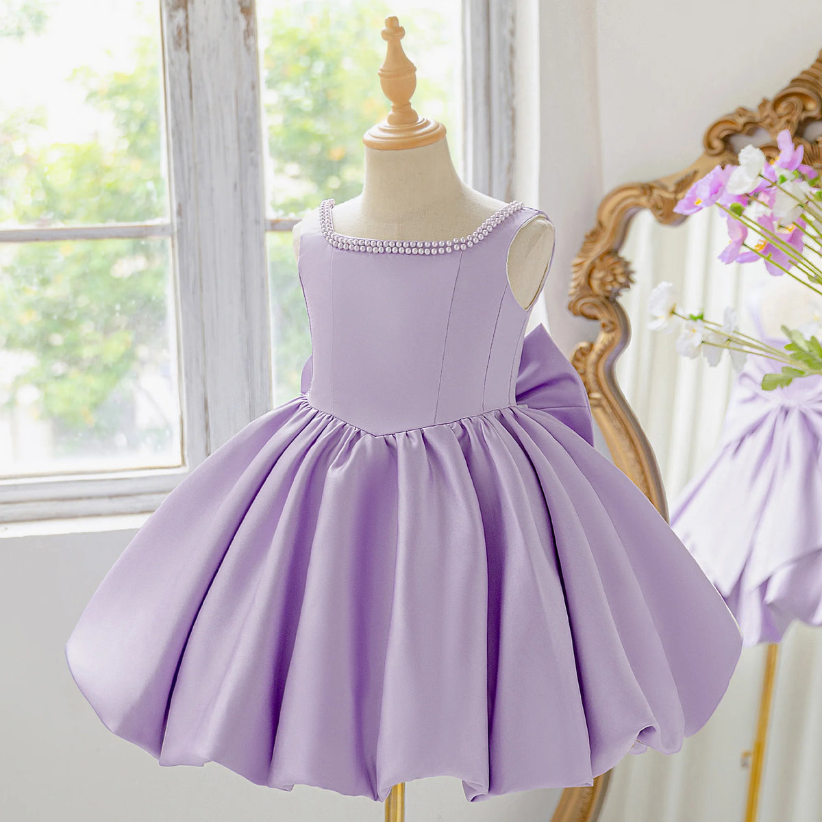 Girls bow tutu party dress worn by child