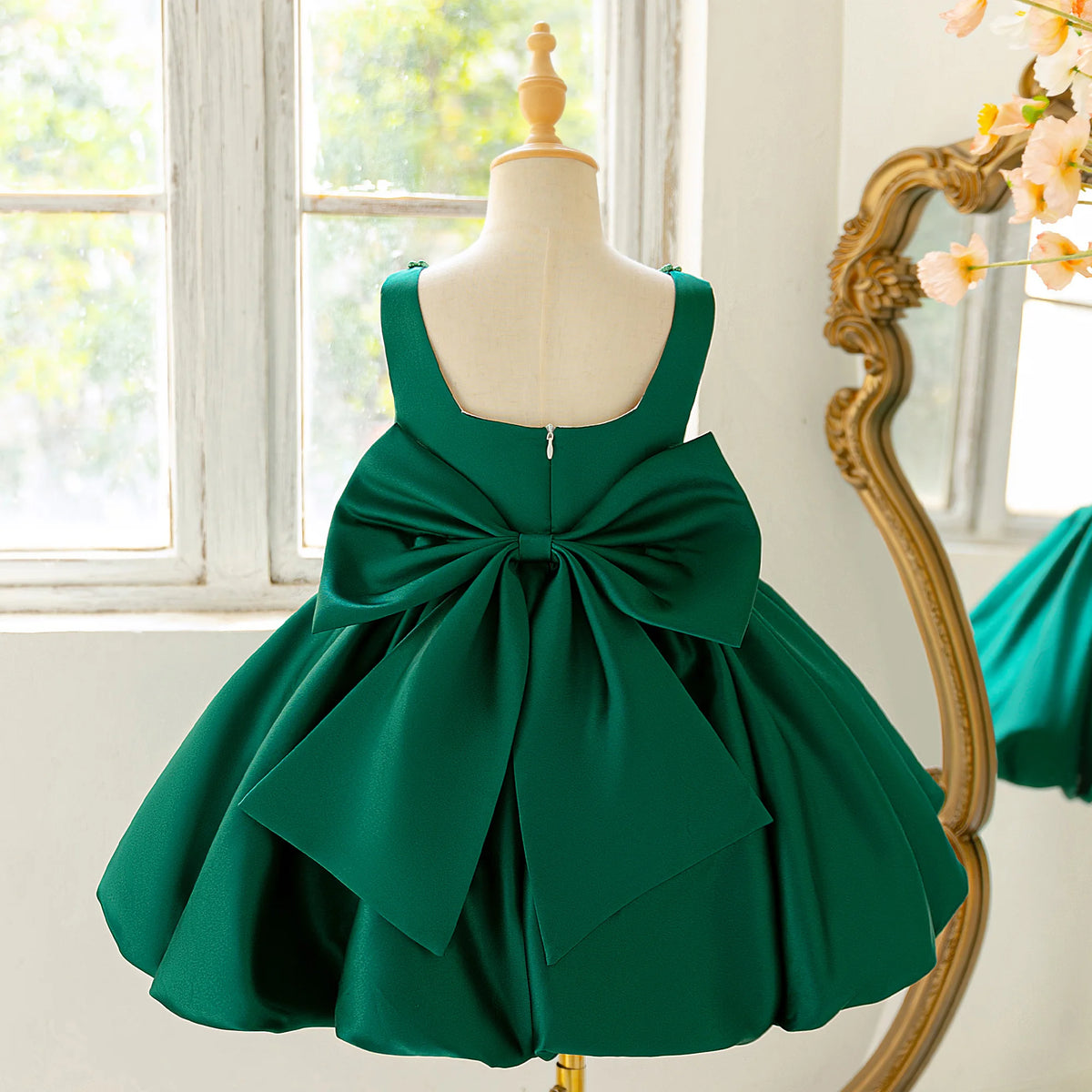 Girls bow tutu party dress worn by child