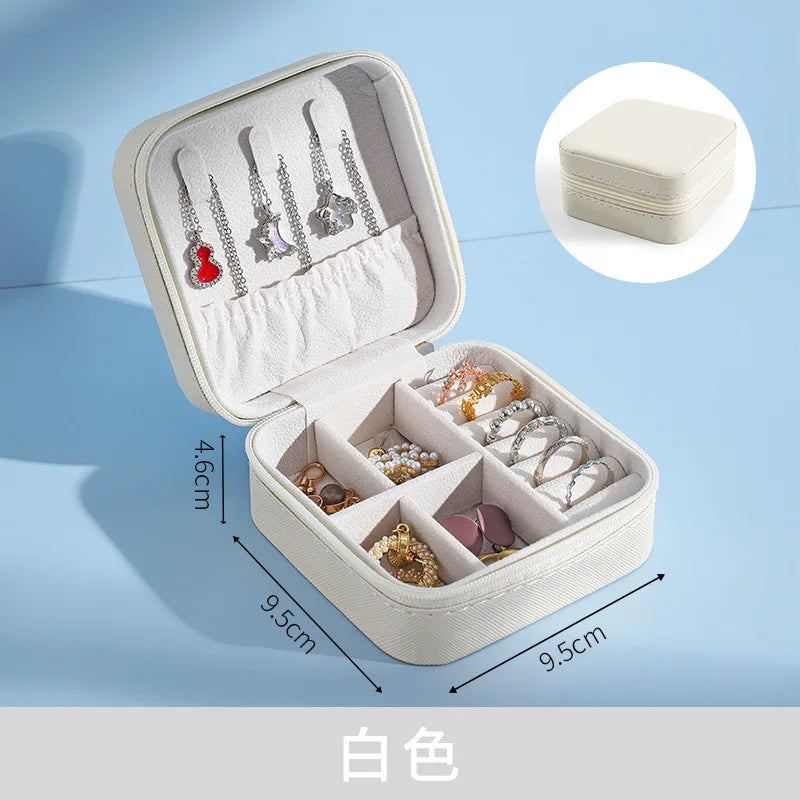 Travel jewelry organizer case interior compartments