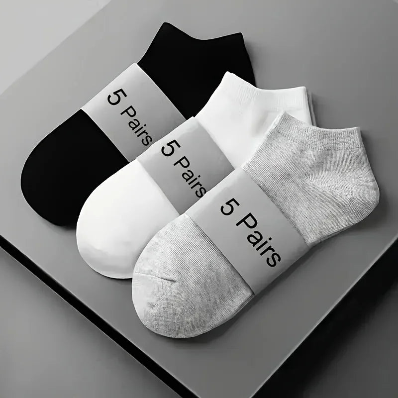 Unisex low-cut ankle socks worn on feet