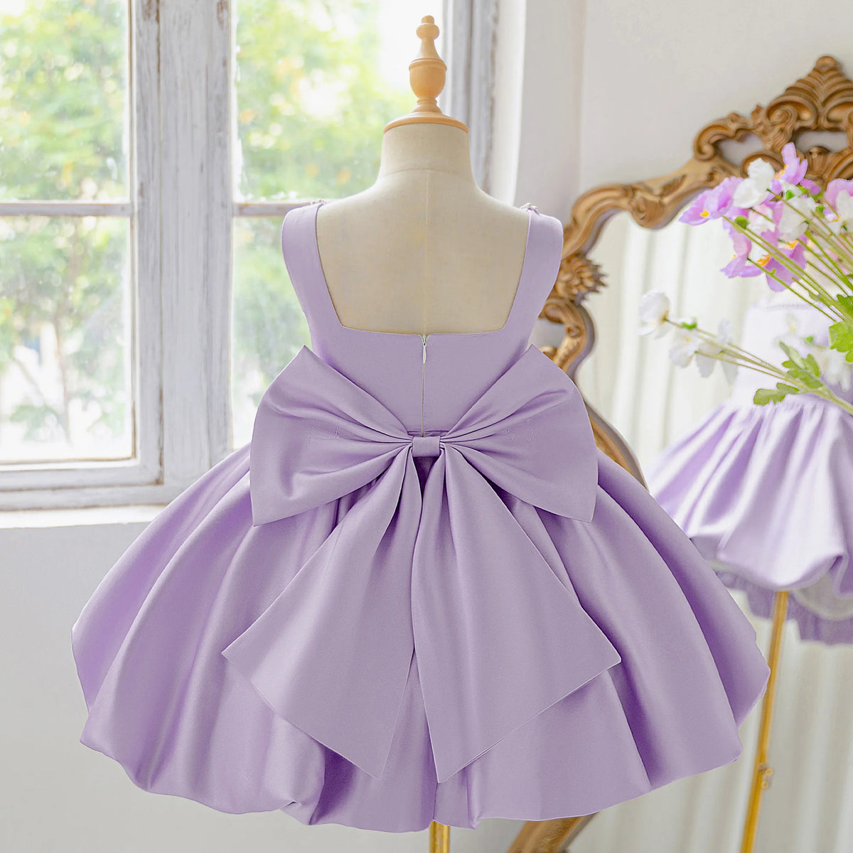 Girls bow tutu party dress worn by child
