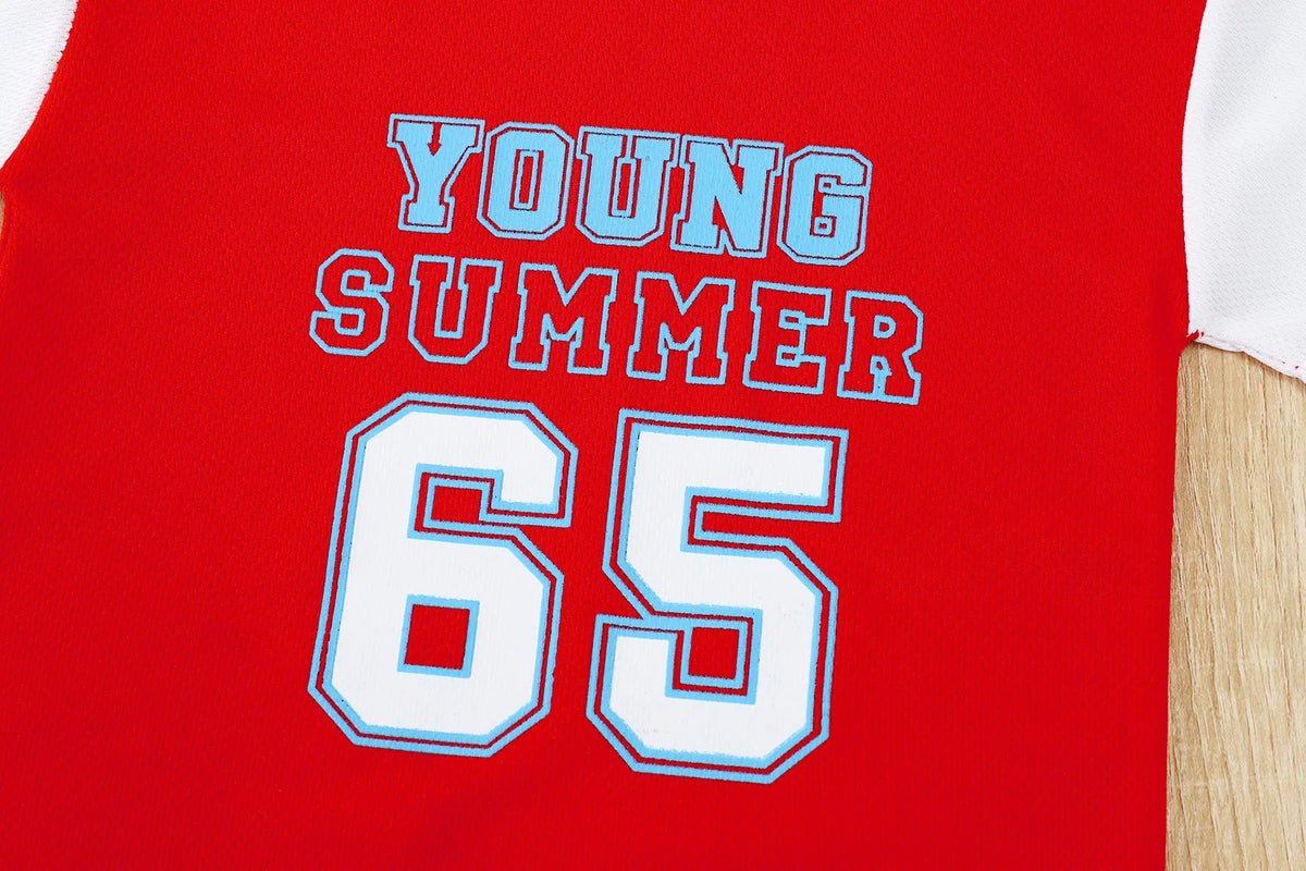 Boys basketball tee & shorts set worn by child