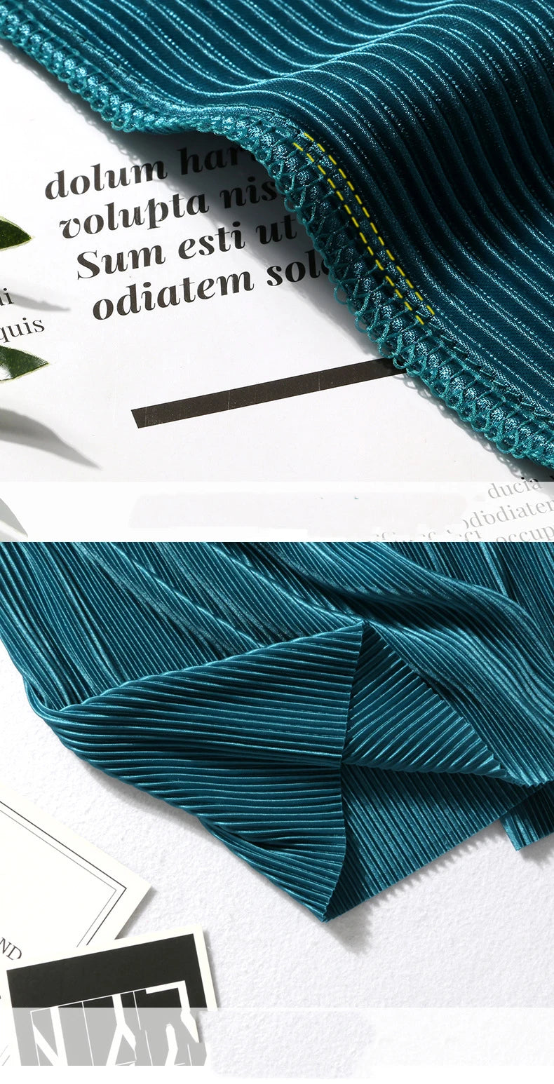 Wide leg ice silk pants teal close up fabric drape