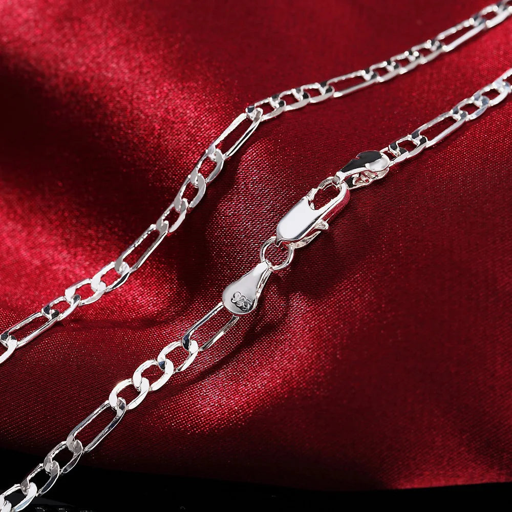 Silver chain bracelet & necklace set worn on neck