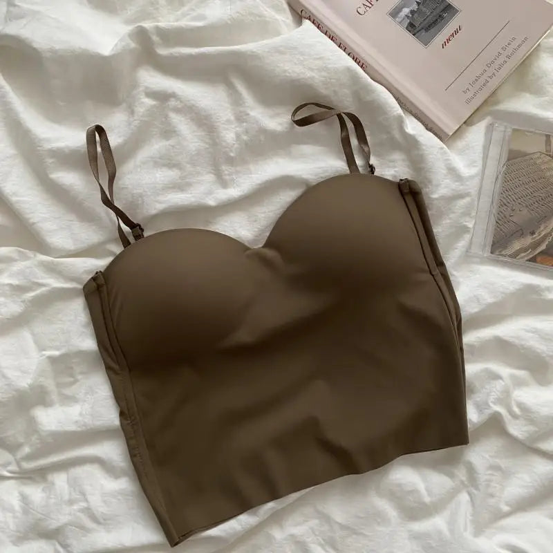 Seamless camisole with built-in cups beige flat lay top view