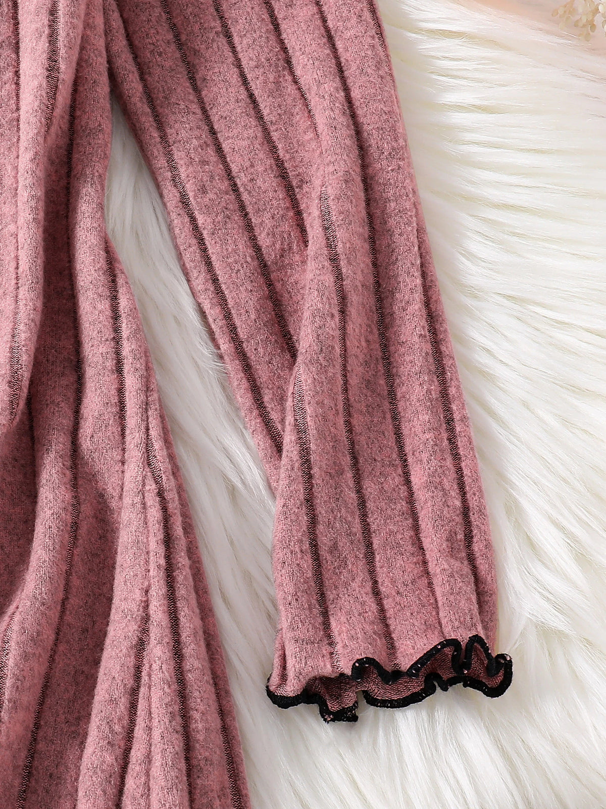 Girls knitted dress side view