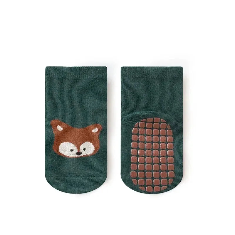 Kids non-slip socks worn on child feet