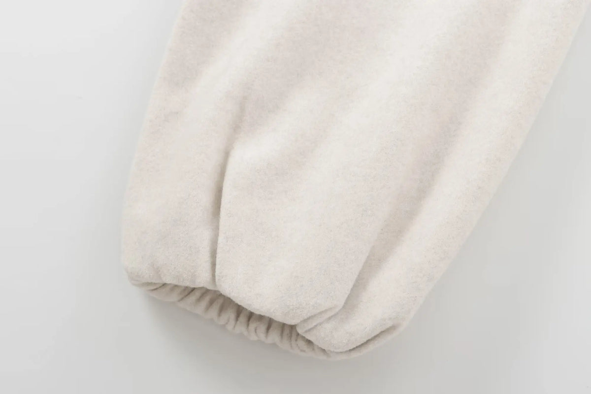 Cropped zip bomber jacket worn styled white