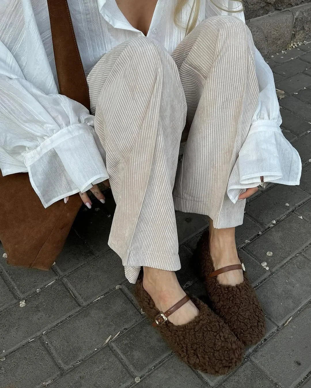 Women's oversized cotton button-up shirt worn as dress