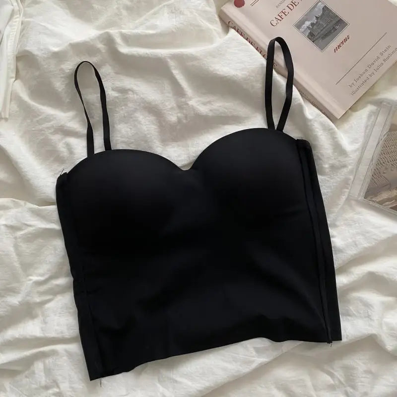 Seamless camisole with built-in cups black flat lay top view