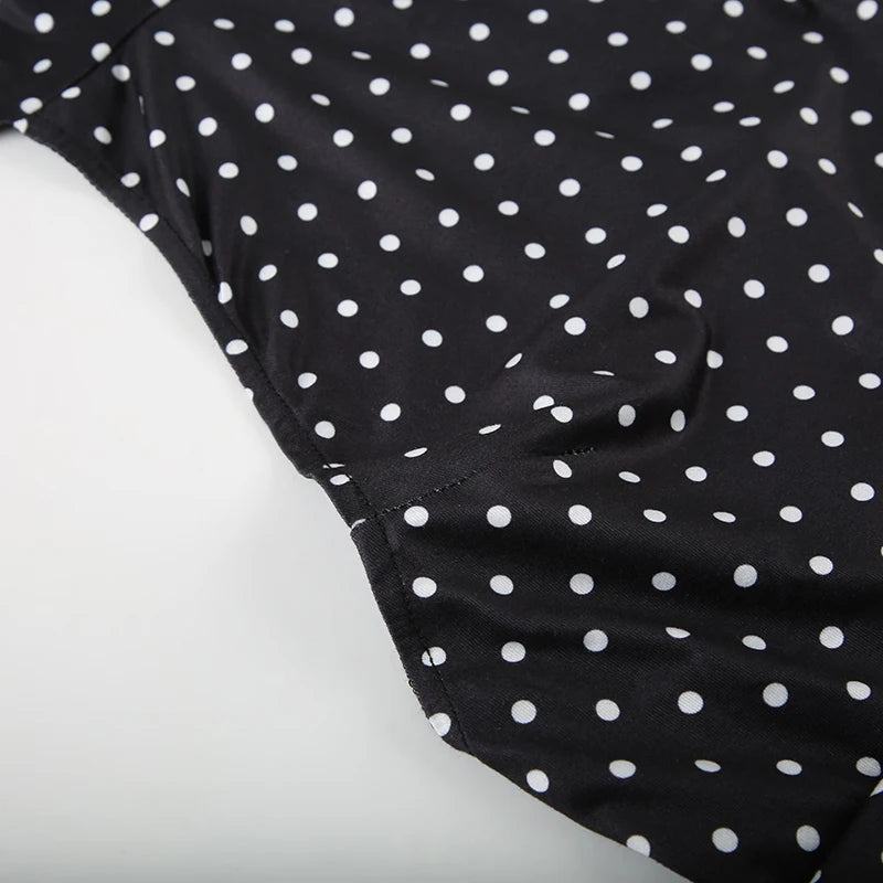 Polka dot halter dress worn with heels
