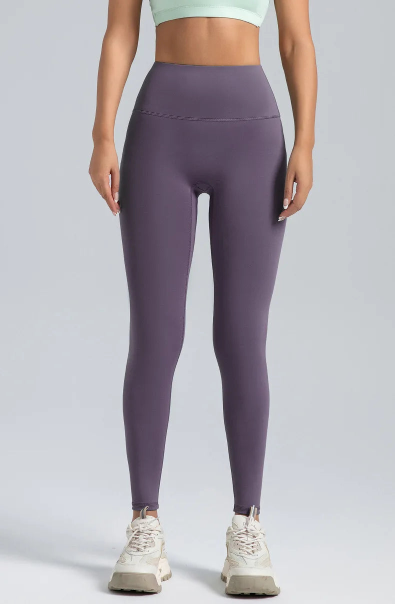High waisted compression leggings worn during workout
