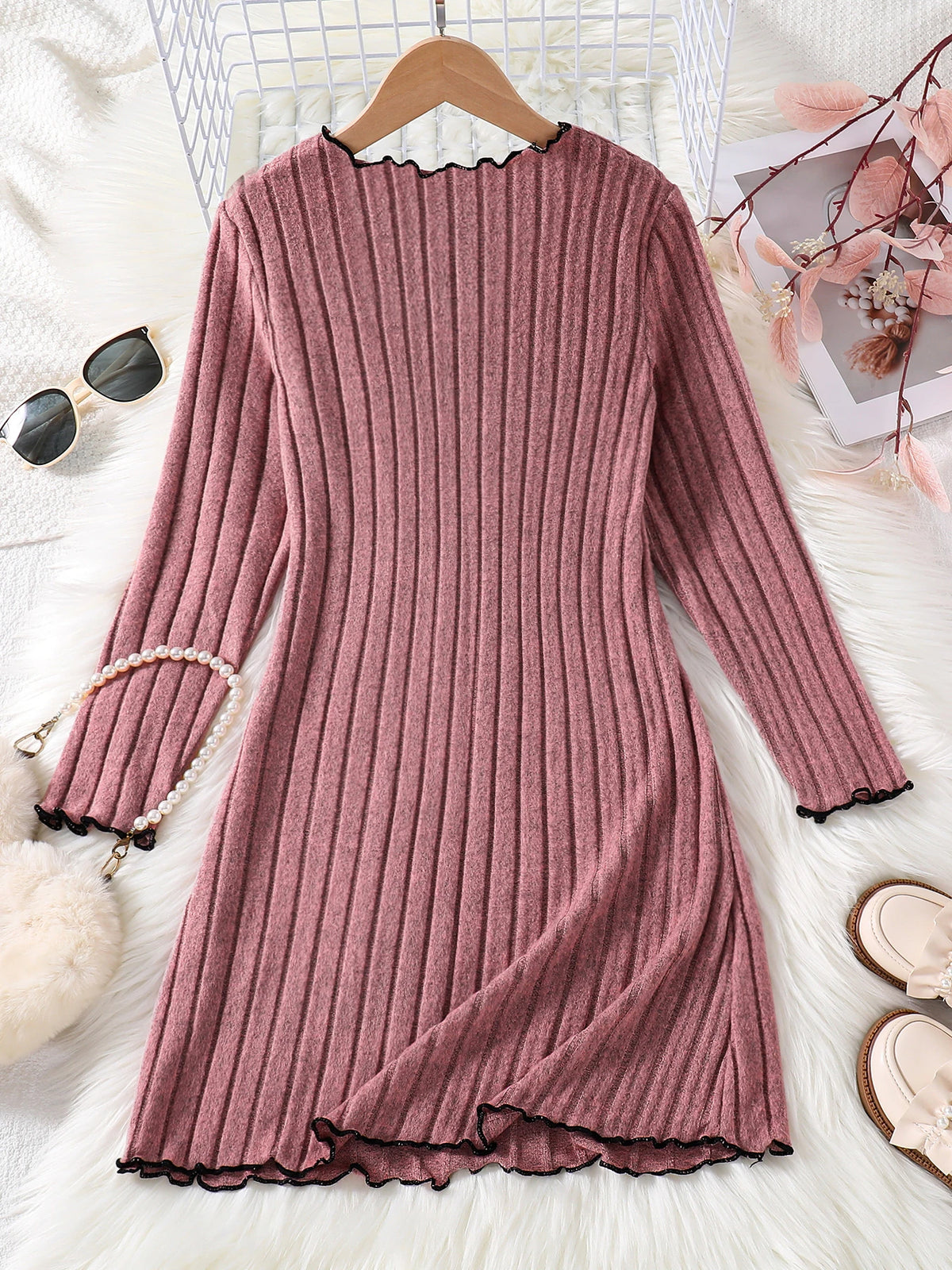 Girls knitted dress side view