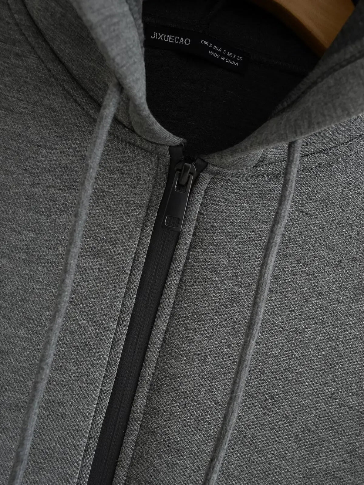 Women's zip-up hoodie jacket front view dark grey