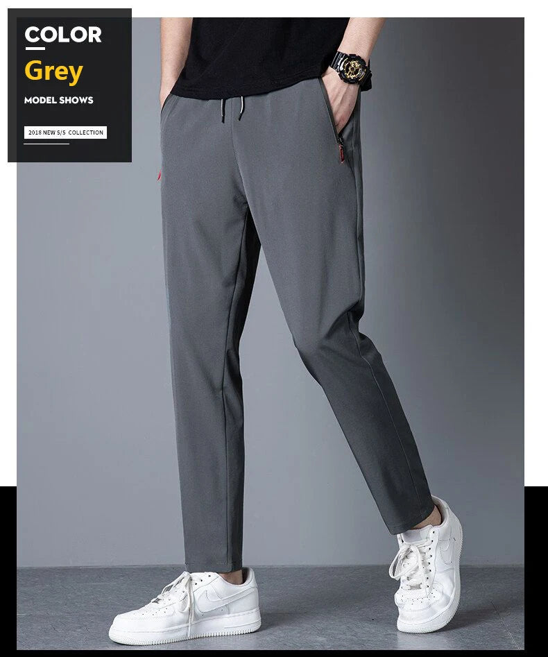 Slim fit jogger pants front view grey