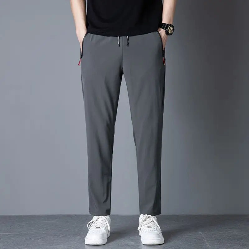 Slim fit jogger pants front view grey