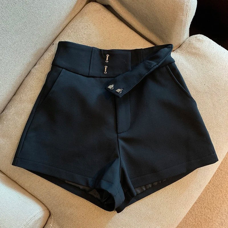 High waisted casual shorts black fabric texture closeup