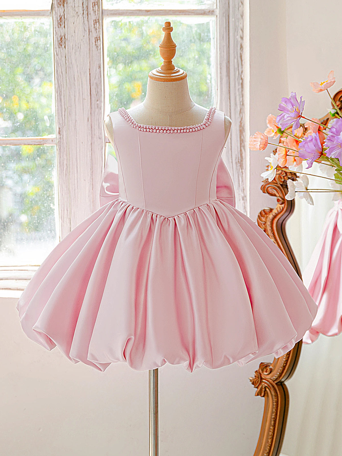 Girls bow tutu party dress worn by child