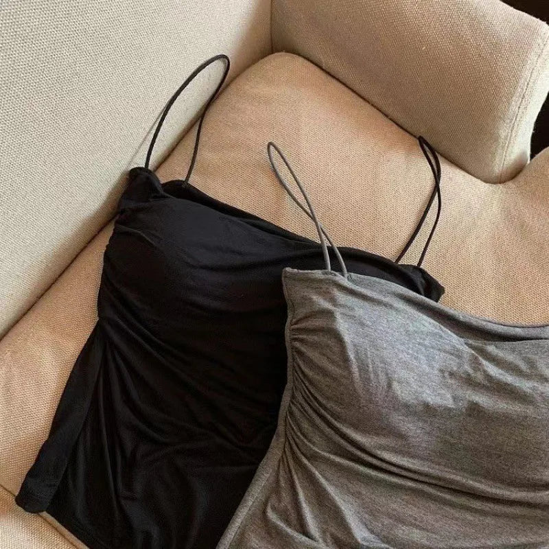  5. Halter tank top with built-in bra black flat lay