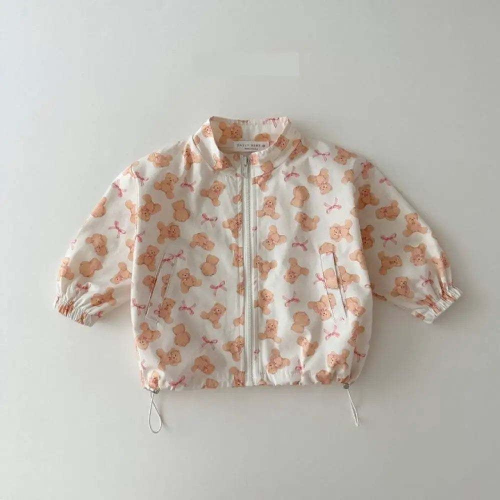 Baby cartoon print sun jacket worn by child