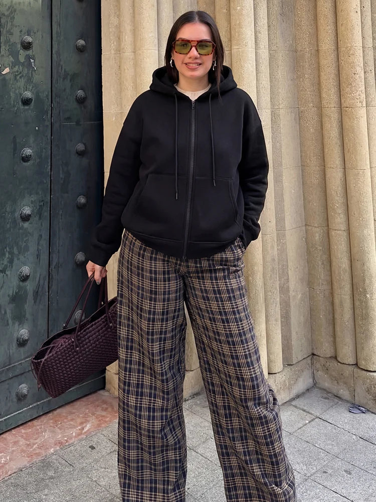 Women's zip-up hoodie jacket front view dark black