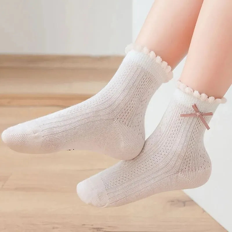 Kids cartoon socks worn on feet