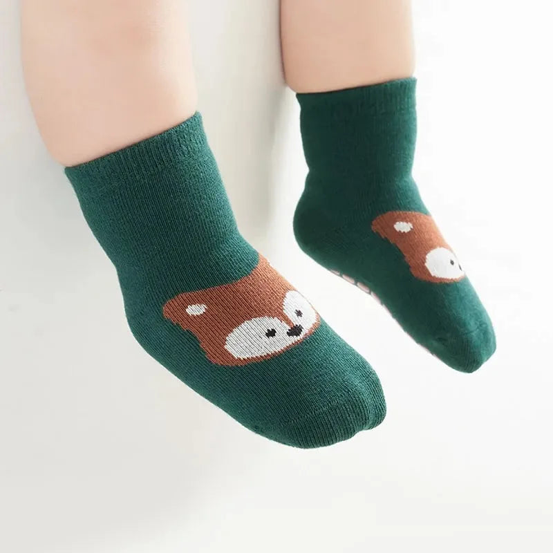 Kids non-slip socks worn on child feet
