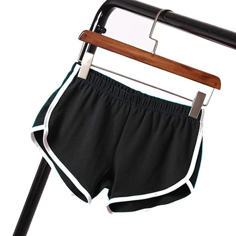 Skinny sports shorts black flat lay with hanger